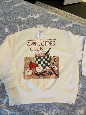 next Cream Crewneck Sweatshirt with Apple Cider Graphic
